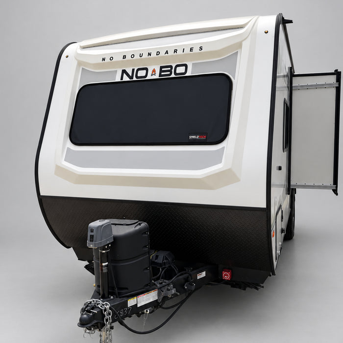 ShieldTech magnetic front window glass protection cover installed on a 2018–2026 Forest River Nobo travel trailer